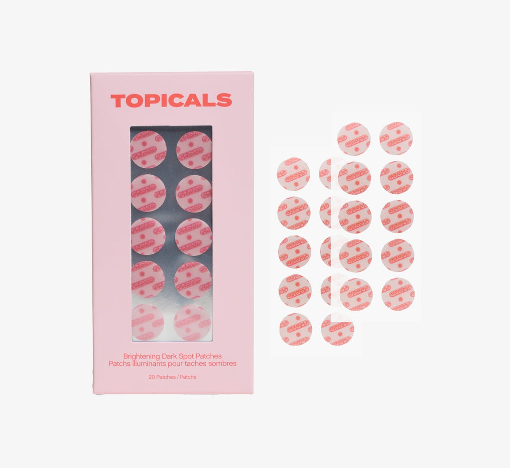 Dark spot remover patches from Topicals Faded showing the pink branded box alongside 20 individual round brightening patches on a white background.