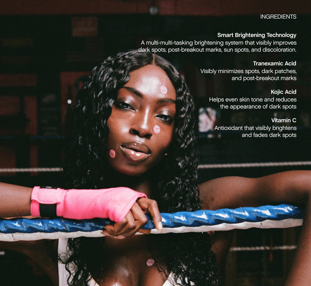 Brightening patches ingredient callout shown on a Black woman with box braids leaning on a boxing ring rope, highlighting tranexamic acid, kojic acid, and vitamin C for dark spots and discoloration.