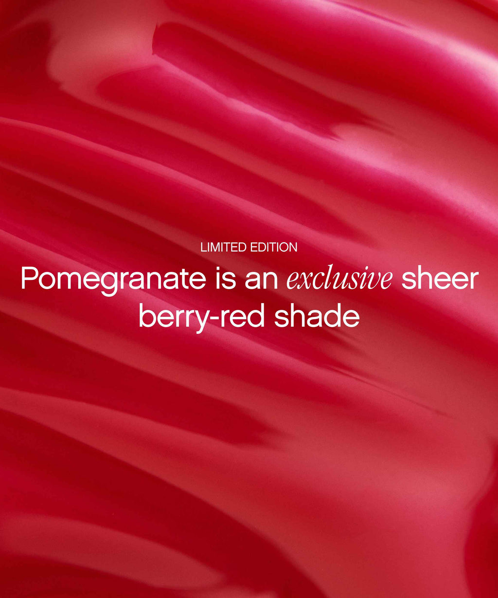 Pomegranate-red silk fabric backdrop announcing the limited-edition sheer berry-red shade of Topicals Slick Salve hyaluronic lip balm.