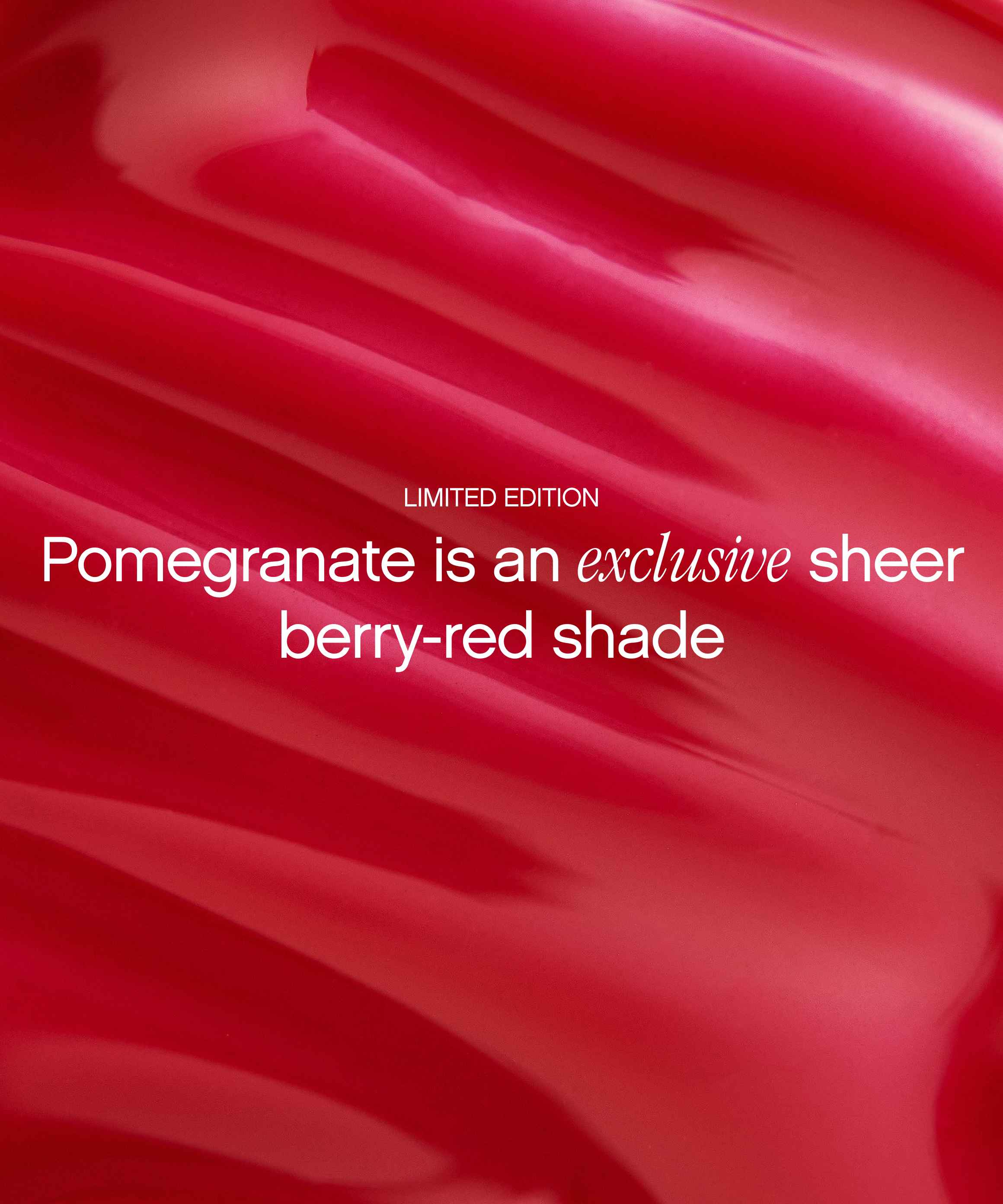 Pomegranate-red silk fabric backdrop announcing the limited-edition sheer berry-red shade of Topicals Slick Salve hyaluronic lip balm.