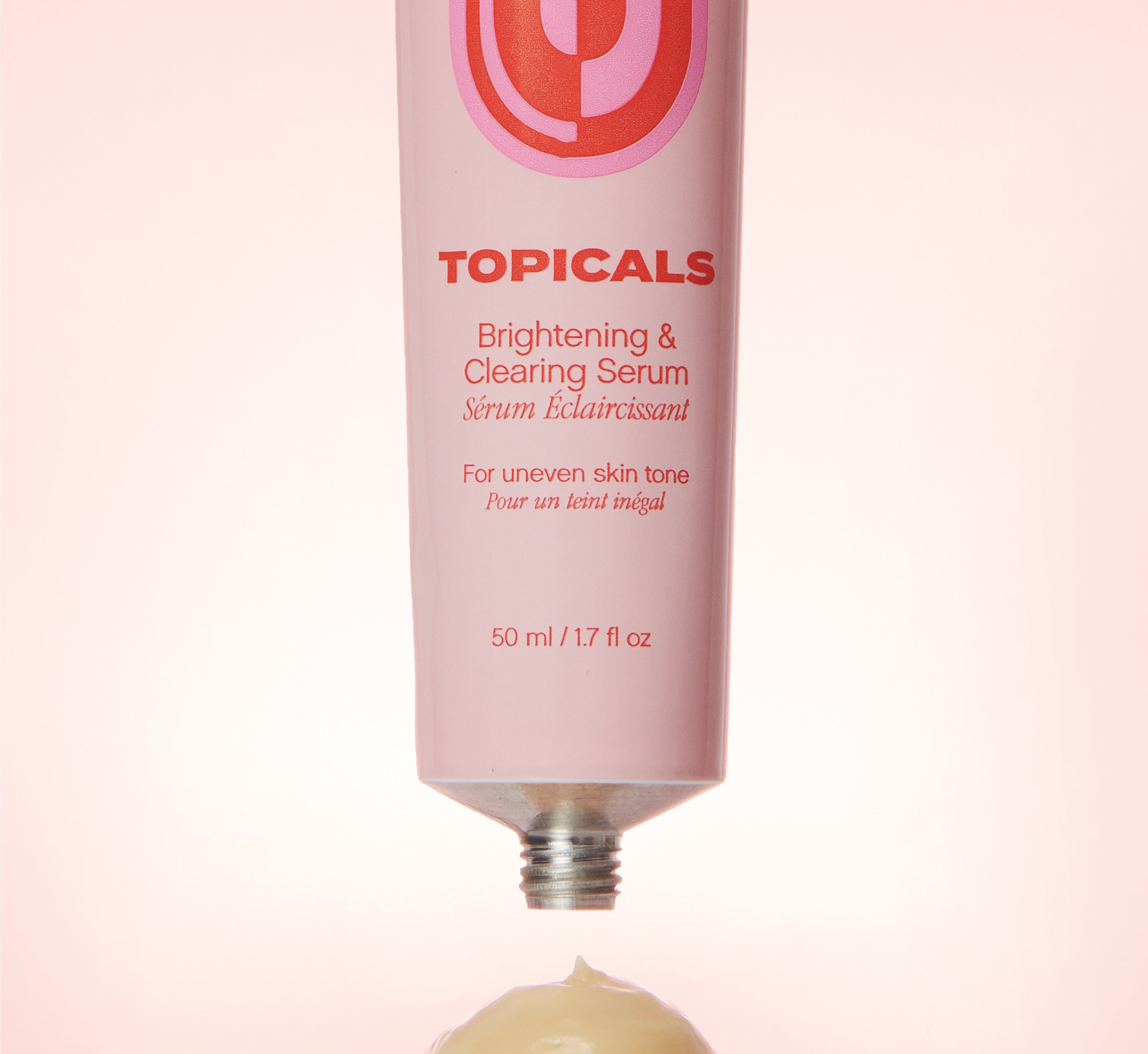 Topicals Faded Brightening and Clearing Serum tube dispensing a dollop of cream, marketed as a face serum for dark spots and uneven skin tone.