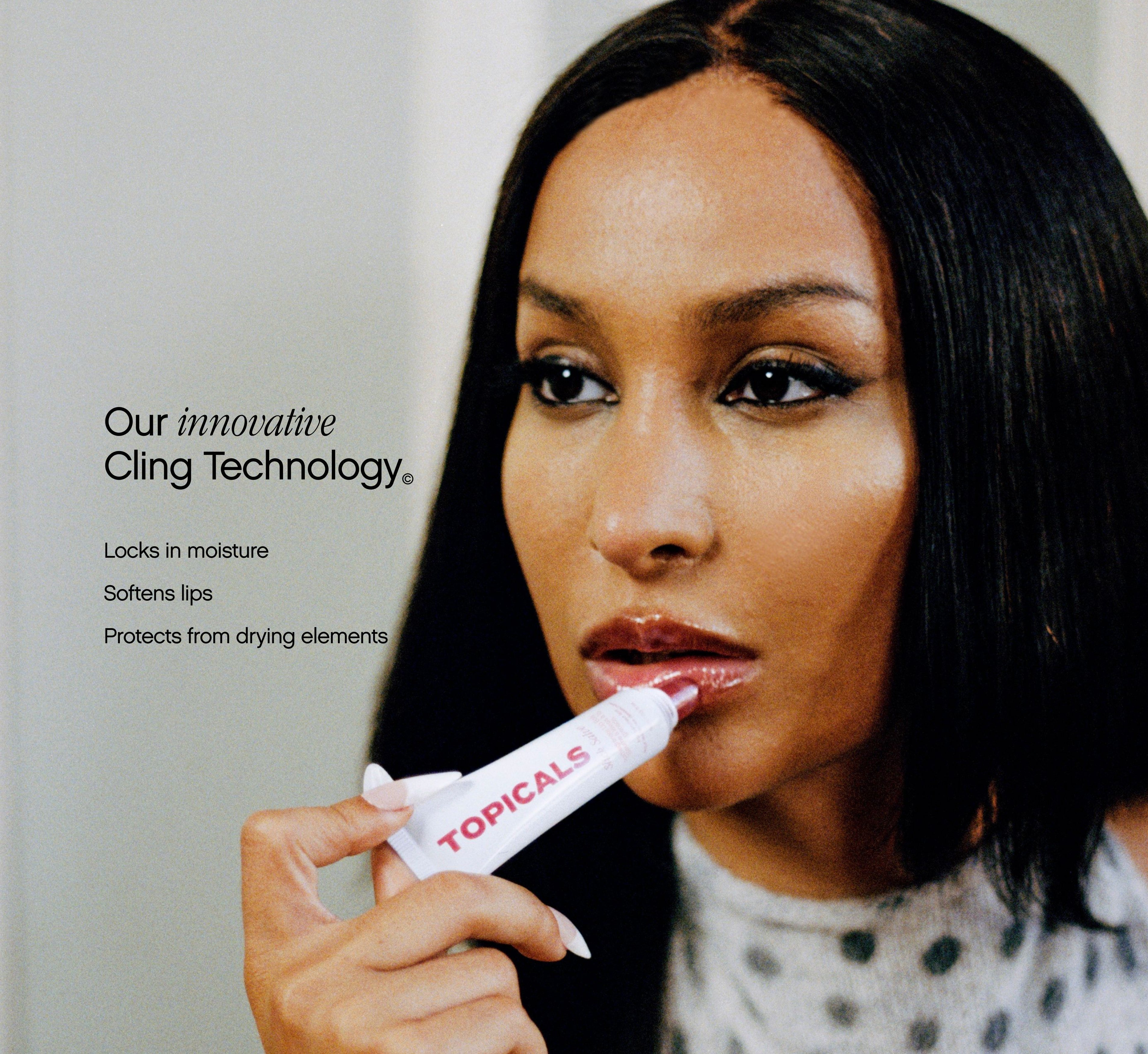 Moisturizing lip balm from Topicals Slick Salve being applied by a woman with a glossy pout, with text highlighting the brand's Cling Technology for locking in moisture and softening lips.