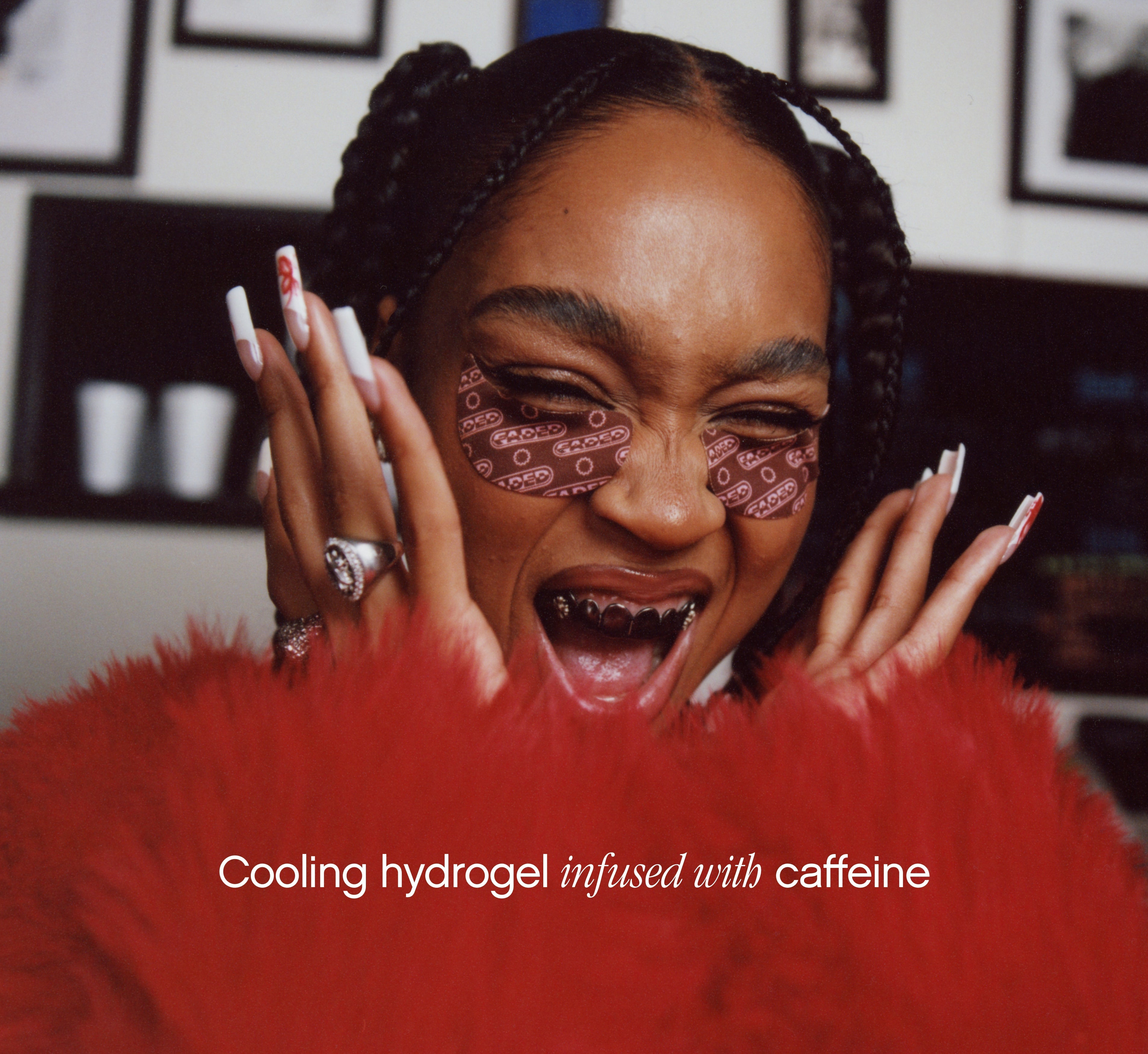 Brightening under eye patches from Topicals Faded in brown worn by a laughing woman with box braids and a red feathered outfit, with text noting the cooling caffeine-infused hydrogel formula.