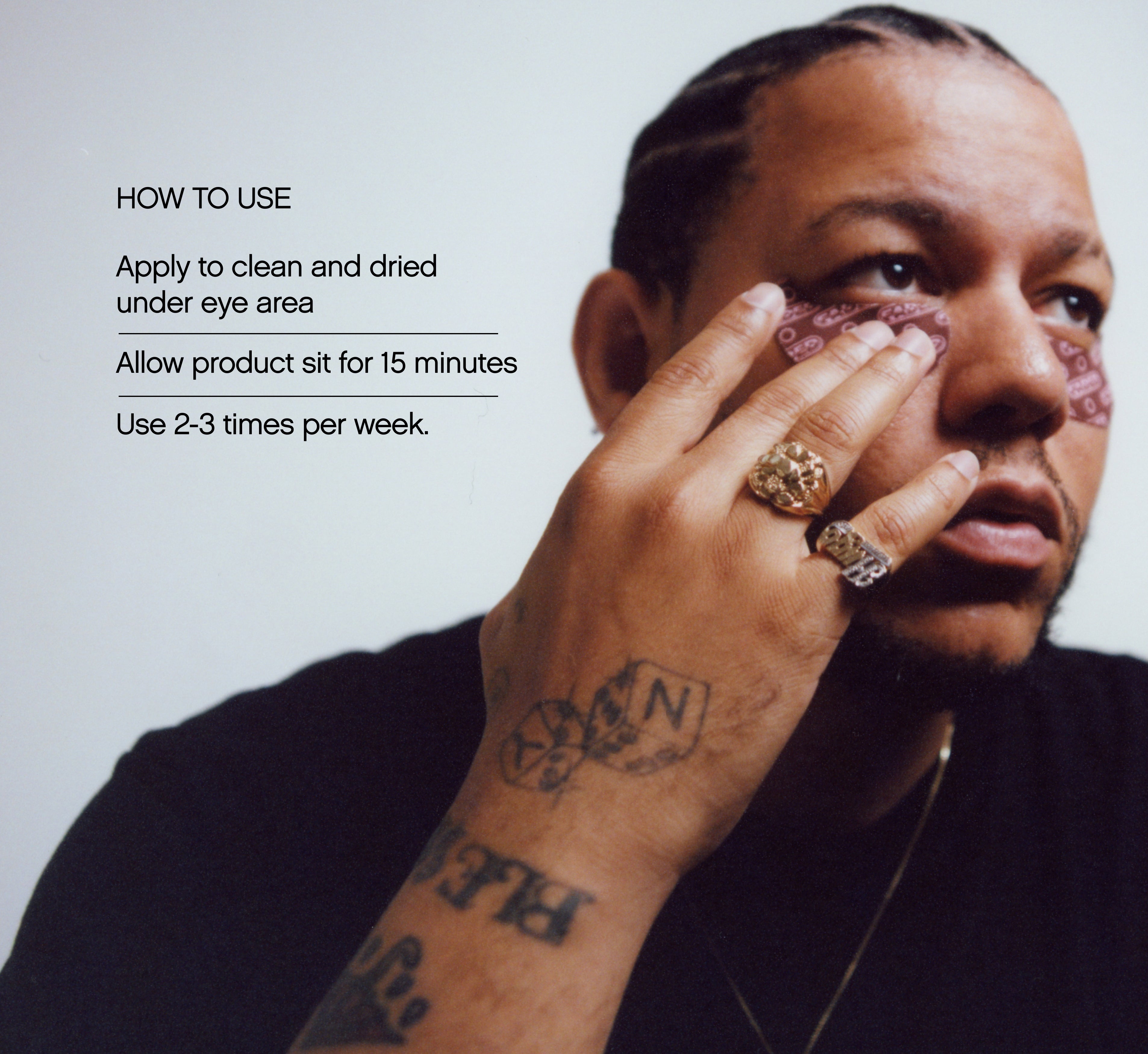 Brightening under eye patches from Topicals Faded shown being applied by a tattooed man with cornrows, accompanied by how-to-use instructions for 15 minutes of wear two to three times a week.