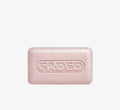 Brightening cleansing bars from Topicals Faded shown as two pink embossed bars stacked on a white background.